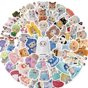 May include: A selection of small animal figurines, such as rabbits, bears, cats, and dogs, in a variety of outfits and poses. Some figurines are wearing hats and costumes. The overall theme is playful and whimsical, with a range of bright colours and detailed designs.