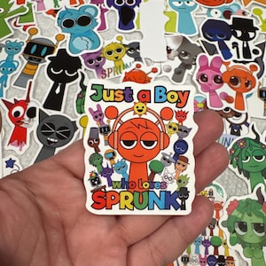 May include: A collection of colorful stickers featuring cartoon characters. One sticker reads "Just a Boy who loves SPRUNK" with an orange character wearing headphones. Other stickers include various creatures in blue, green, and purple.