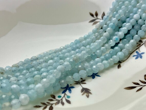 thumbnail image 2 of Brazilian Aquamarine Rondelle Beads – 2x4mm Faceted Abacus Shape – Light Blue – 15 Pieces 2 of 5