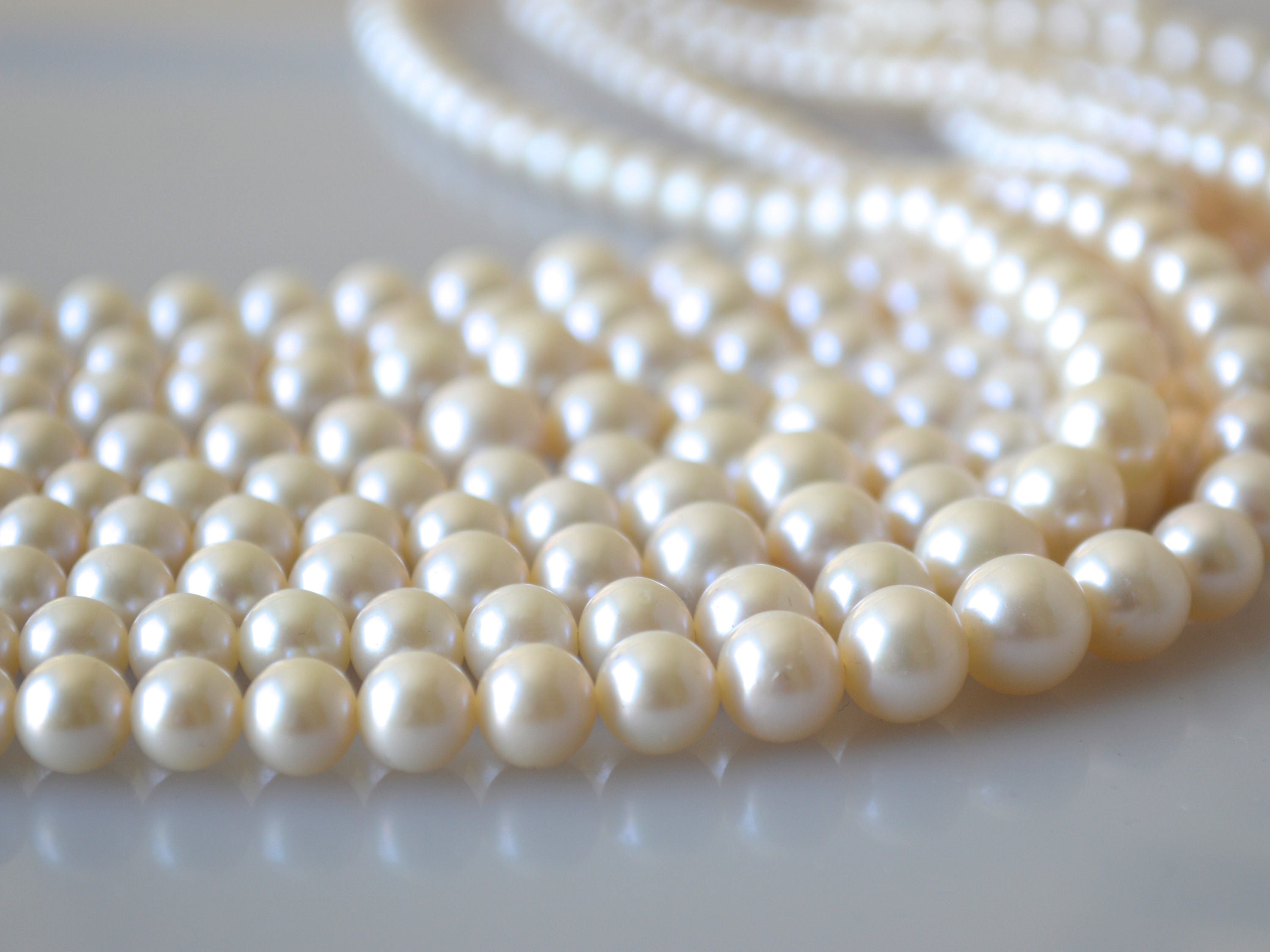 Pearl, cultured freshwater (bleached), white, 20x2mm-25x4mm top-drilled  stick, C grade, Mohs hardness 2-1/2 to 4. Sold per 4-inch strand,  approximately 30-35 beads. - Fire Mountain Gems and Beads