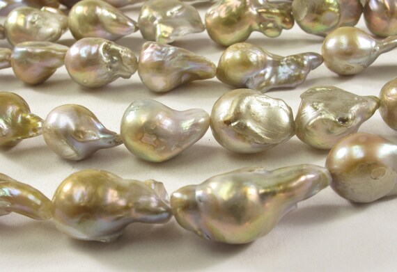 Tira de perlas de río barrocas color gris cuentas irregulares semiplanas  aspecto tornasolado