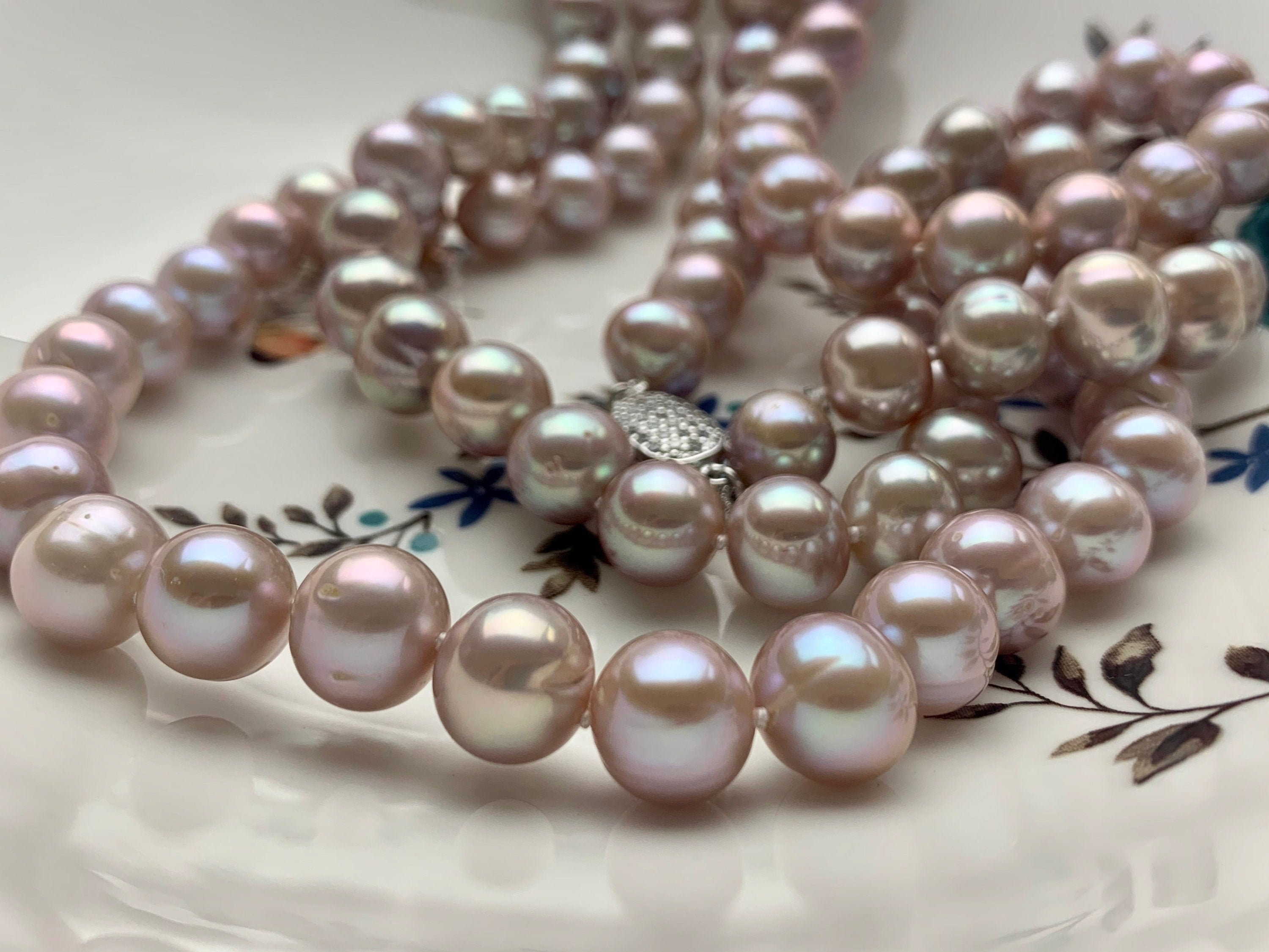Pink pearl necklace value sale