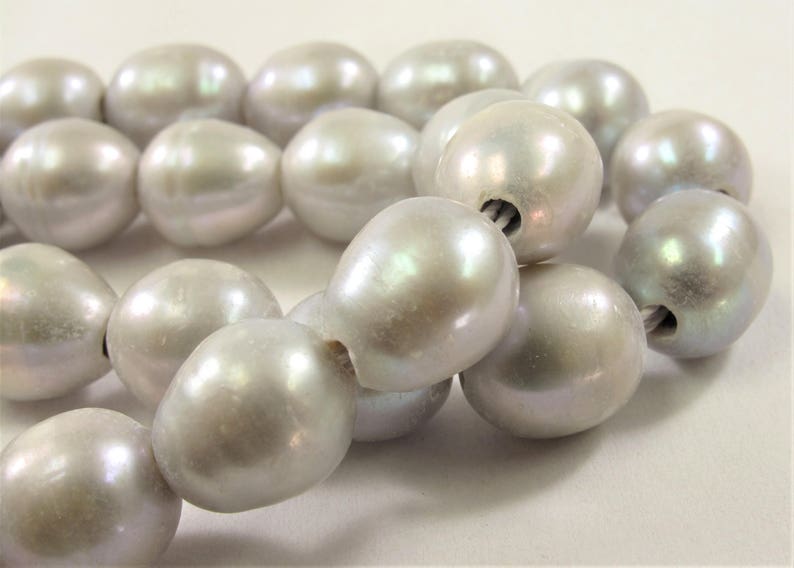 #230 10-12mm Half Strand Large Hole Natural White Semi Round Pearl 2 mm Hole