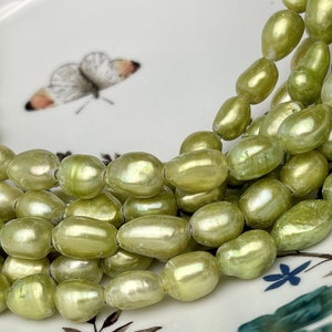 9x11-12mm AA Half Strand Large Hole Green Color Freshwater Rice Nugget Pearl Hole Size 2.2mm High Luster Lime Green Pearl #P2320