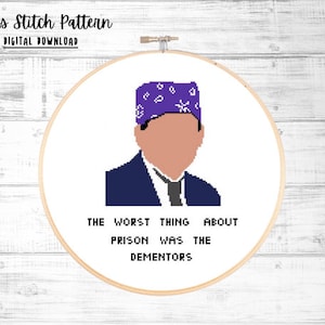 May include: Cross stitch pattern featuring a cartoon of a man wearing a purple bandana and a blue suit. The text below reads "The worst thing about prison was the dementors."