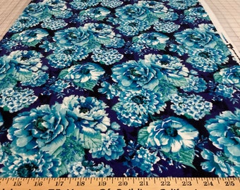 Flannel/Blue, white and teal flowers on purple background cotton fabric