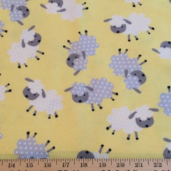 Flannel/Gray and white sheep on yellow background cotton fabric