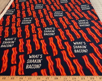 Flannel/Bacon on navy blue background cotton fabric