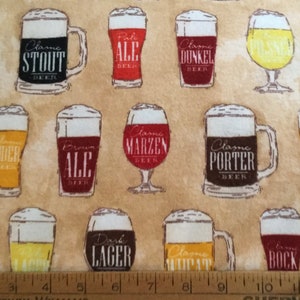 Flannel/Glasses of beer on beige background cotton fabric