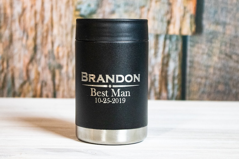 May include: Black insulated can cooler with the name "BRANDON" engraved in silver lettering, along with the words "Best Man" and the date "10-25-2019".