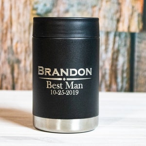 May include: Black insulated can cooler with the name "BRANDON" engraved in silver lettering, along with the words "Best Man" and the date "10-25-2019".