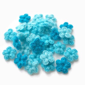 Set of 33 tiny crochet woolen flowers