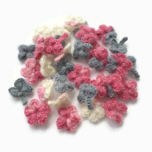Crochet woolen flowers and shamrocks Set of 33 tiny floral applique