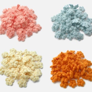 Tiny woolen crochet flowers
