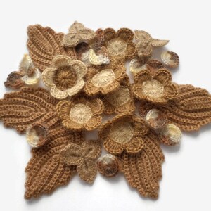 Woolen crochet flowers leaves shamrocks Set of 23 Mohair applique Clothes Hats Mittens Interior decor