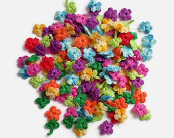 Set of 50 tiny crochet flowers