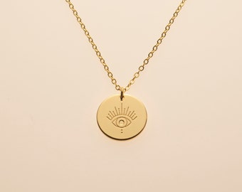 Collier disque avec pendentif oeil qui voit tous