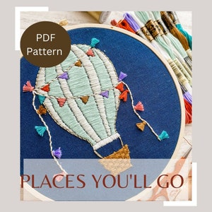 May include: A PDF pattern for a hand-stitched embroidery design of a hot air balloon with colorful tassels and the text "Places You'll Go".