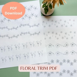 May include: Printable PDF with various floral trim designs. The designs include flowers, vines, and leaves. The text "FLORAL TRIM PDF" is at the bottom of the page.