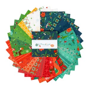 May include: A set of 24 fabric squares featuring a variety of winter-themed patterns in red, green, and white. The squares are arranged in a fan shape and labeled "In From the Cold" by Heather Bailey.