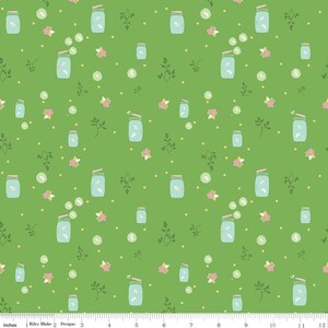 May include: A green fabric with a repeating pattern of light blue mason jars, pink flowers, and green leaves. The jars have wooden lids and are scattered across the fabric. Small yellow dots fill the background.
