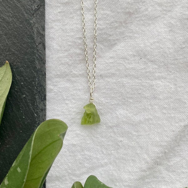 Raw natural Peridot necklace wire wrapped in silver • august birthstone