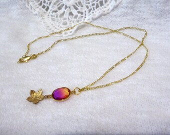 18 kt gold filled ketting met een bedel van paarse en gele quarts en bloemen
