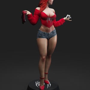 May include: A statue of a woman with red hair, wearing a red top with a spider emblem, denim shorts, and red shoes. She holds a camera and a pair of red gloves. The statue stands on a black base with a white spider symbol.