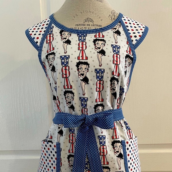 Red White Blue Nostalgic Betty Boop USA Print on Retro-Inspired Apron, Polka Dot Yoke, Patch Pockets, Custom Bias Trim, Amber Court Designs