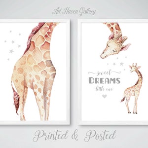 May include: Two watercolor prints featuring a giraffe. The first print shows a giraffe from the back, with a light brown and orange spotted pattern. The second print shows a giraffe's head and neck, with a smaller giraffe standing below. The text "sweet DREAMS little one" is written in gray on the second print.