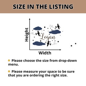 May include: A black and white illustration of two airplanes flying through clouds with stars. The name "Logan" is written in a cursive font below the clouds. The image is used to illustrate the size of a wall decal.