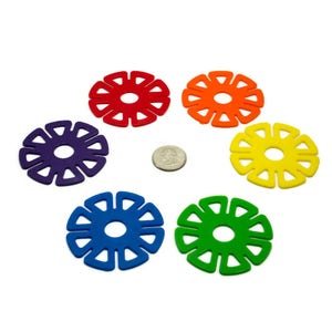 May include: Six colorful plastic flower-shaped pieces with a hole in the center. The pieces are red, orange, yellow, green, blue, and purple.