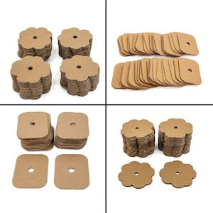 May include: A set of cardboard flower-shaped and square-shaped pieces, some stacked in piles. The pieces have a hole in the center and are made of brown cardboard.