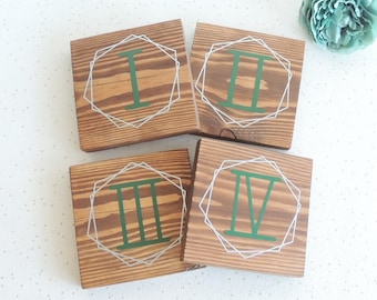 Wedding table numbers, geometric decor, silver and green signs, guest table numbers, unique table ideas, roman numerals, wooden table names