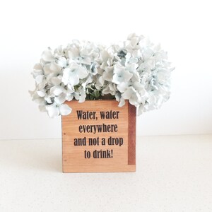 Jardinière en bois pour succulentes : décoration rustique « De l'eau partout »