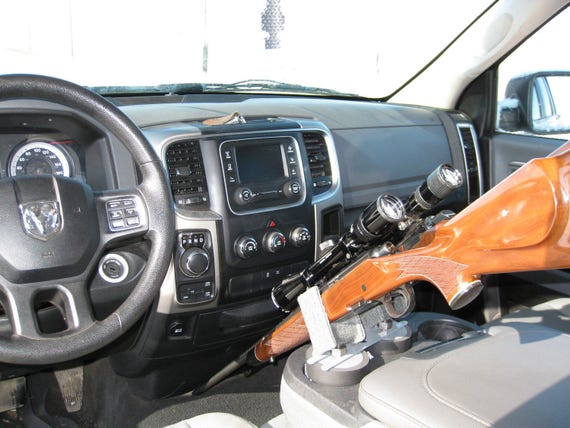 Gun holders for trucks with center 