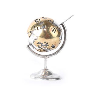 Globo pequeño giratorio de plata de ley 925 y vermeil de oro, de la marca Vintage Taxco.