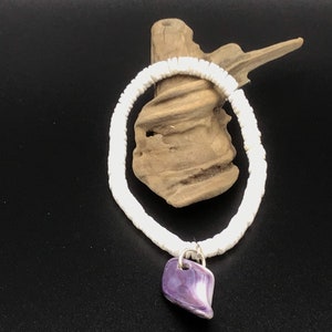 Pucca Shell en Wampum Armband