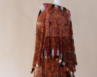 Jean Paul Gaultier Maille mesh poncho and skirt set in paisley print with fringe