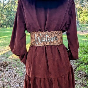 Bridal waist cincher tooled leather belt.