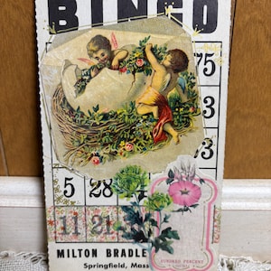 Tarjeta de bingo vintage con ángeles victorianos en un huevo de Pascua