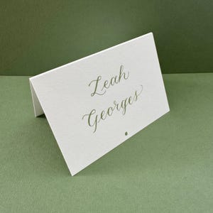 Green calligraphy tented place cards