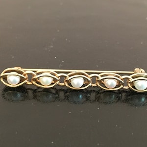 Broche à chaîne de perles remplie d’or et de culture