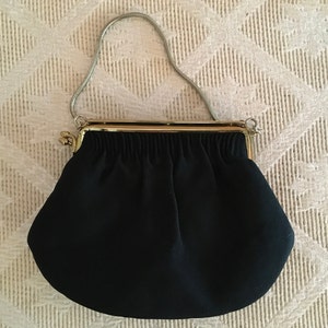 Bolsa de noite preta pequena com fecho lateral