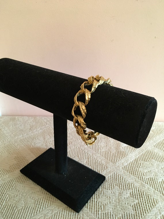 TAT Gold Tone Link Bracelet