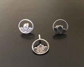 Set verkleinde sterlingzilveren oorbellen en hangers