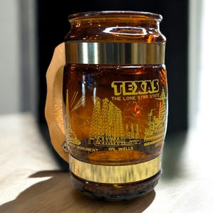 Retro 70s Texas Souvenir Tiki Beer Mug - Amber glass, The Lone Star State, San Jacinto Monument, oil wells, The Alamo, Battleship Texas