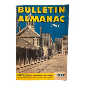 May include: A vintage cover of the Bulletin Almanac from 1964. The cover features a black and white photo of a street scene in Philadelphia, Pennsylvania. The text on the cover reads "Bulletin Almanac 1964" and "608 Pages of Useful Information About Greater Philadelphia".