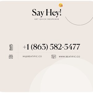 a white business card with the words say hey