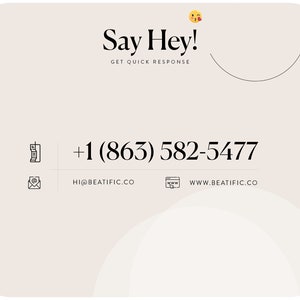 a white business card with the words say hey